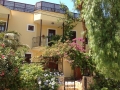 Front entrance with bougainvillea